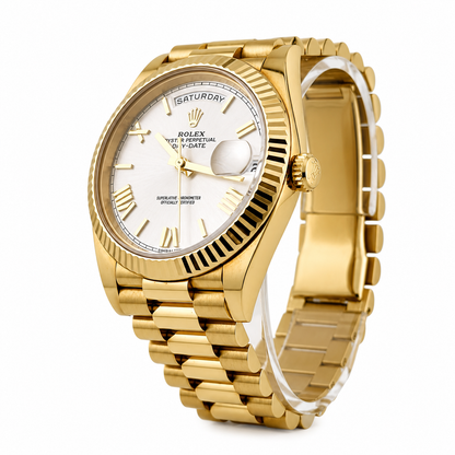 Gold wristwatch with a white face on a white background